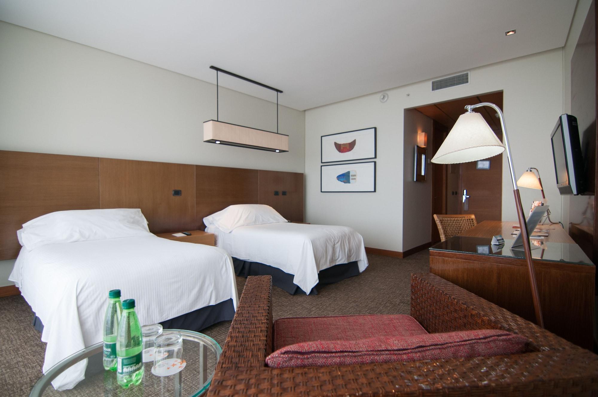 Отель Enjoy Кокимбо Экстерьер фото A room at the hotel