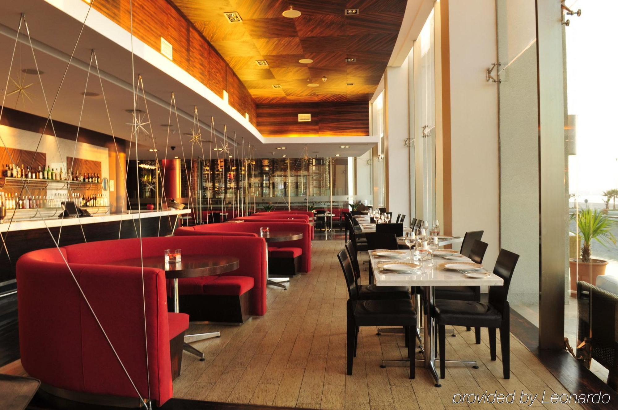 Отель Enjoy Кокимбо Ресторан фото The interior of the restaurant