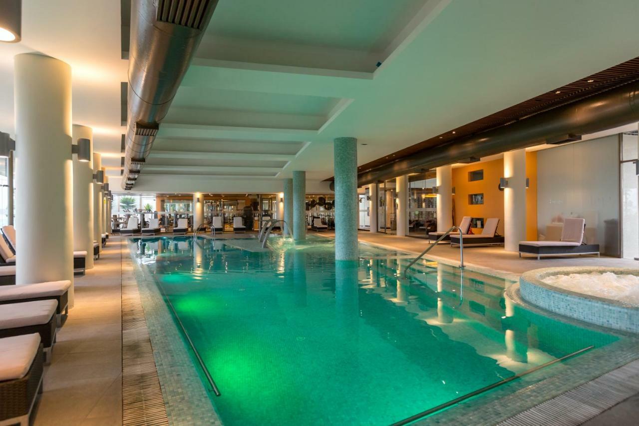 Отель Enjoy Кокимбо Экстерьер фото The swimming pool at the hotel